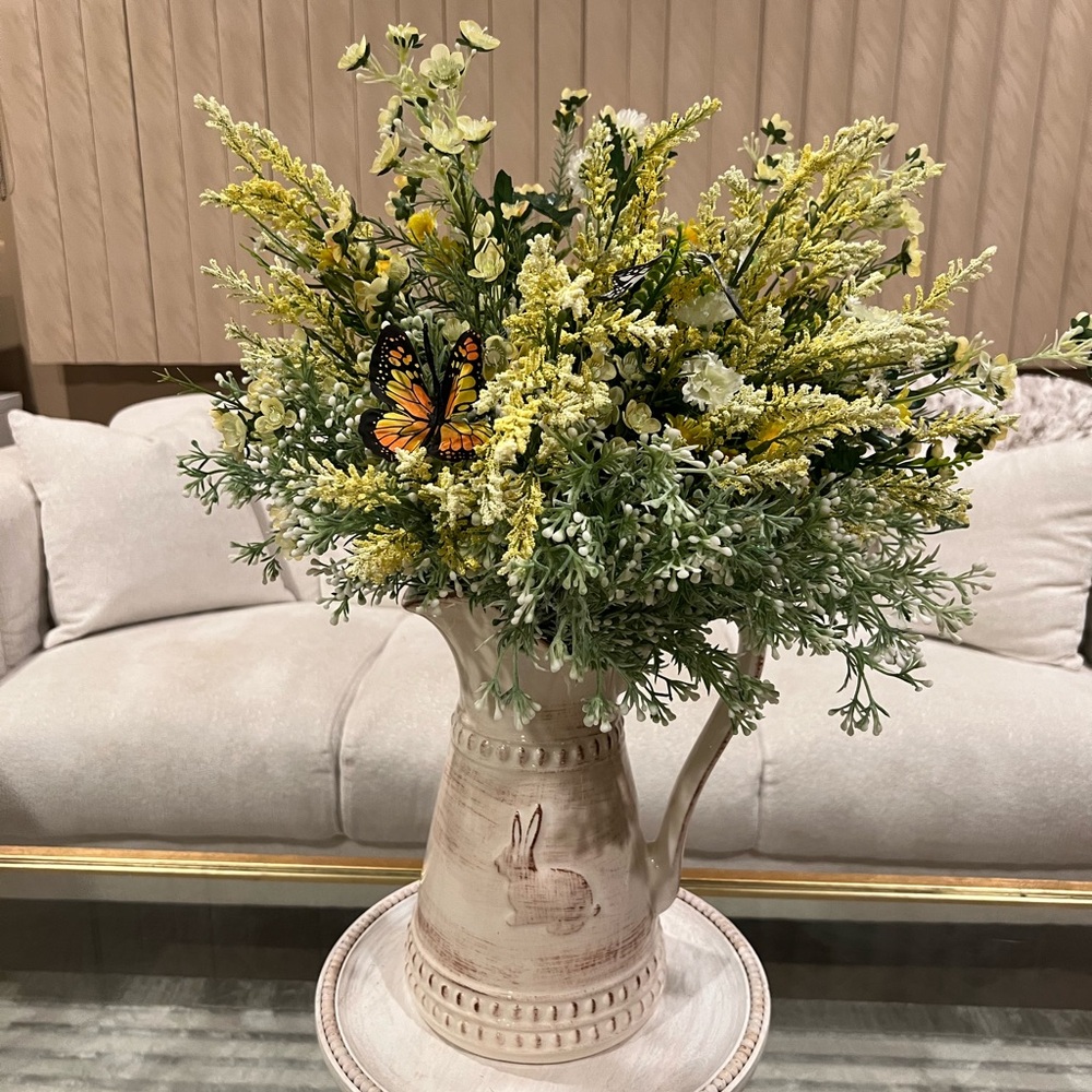Rustic Cream Vase with Yellow and Green Floral Arrangement
